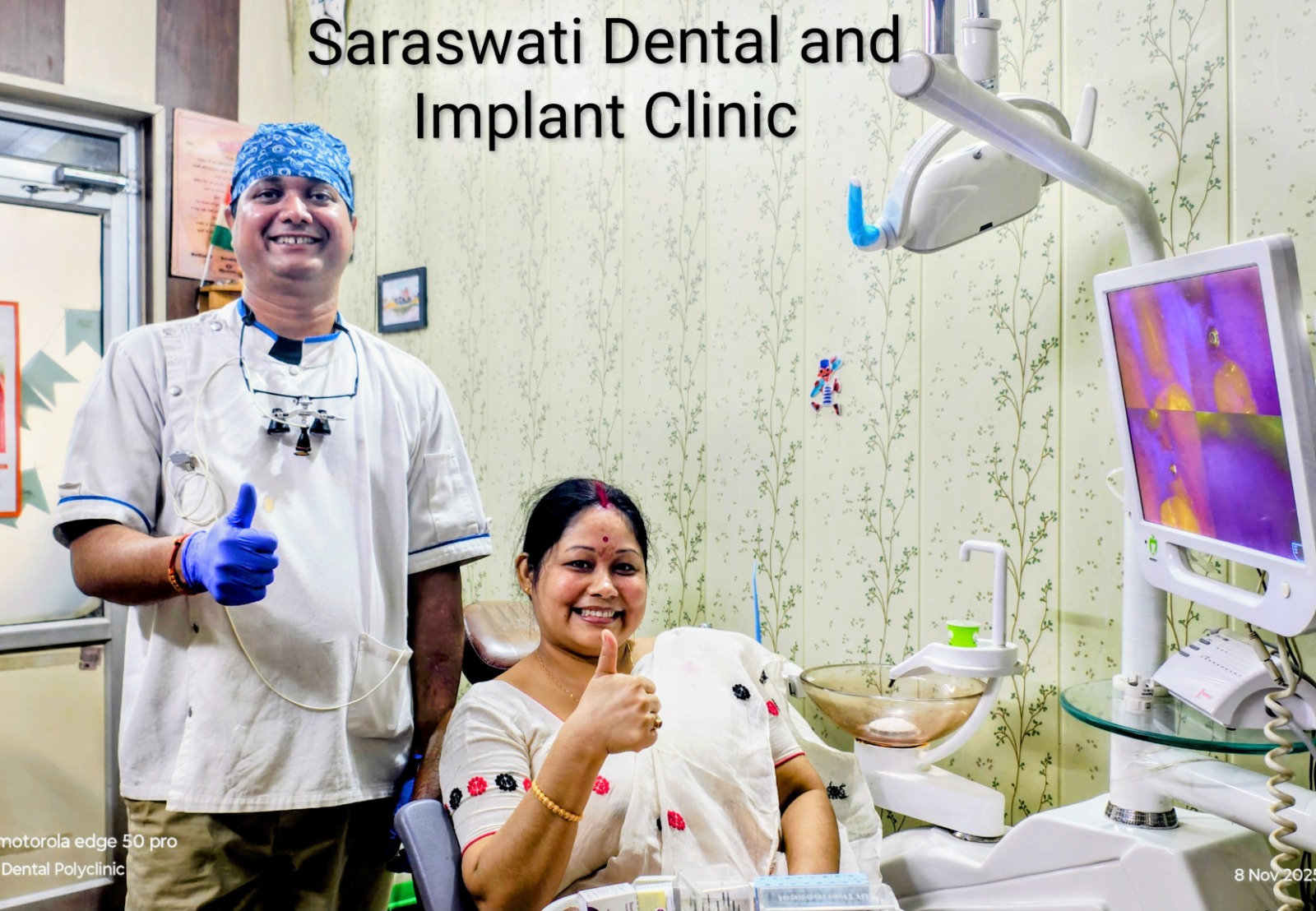 Dr. Devesh Mishra with happy patient at Saraswati Dental & Implant Clinic